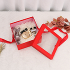 Red Art Paper Kraft Gift Box With Window Rope Handle For Perfume Packaging